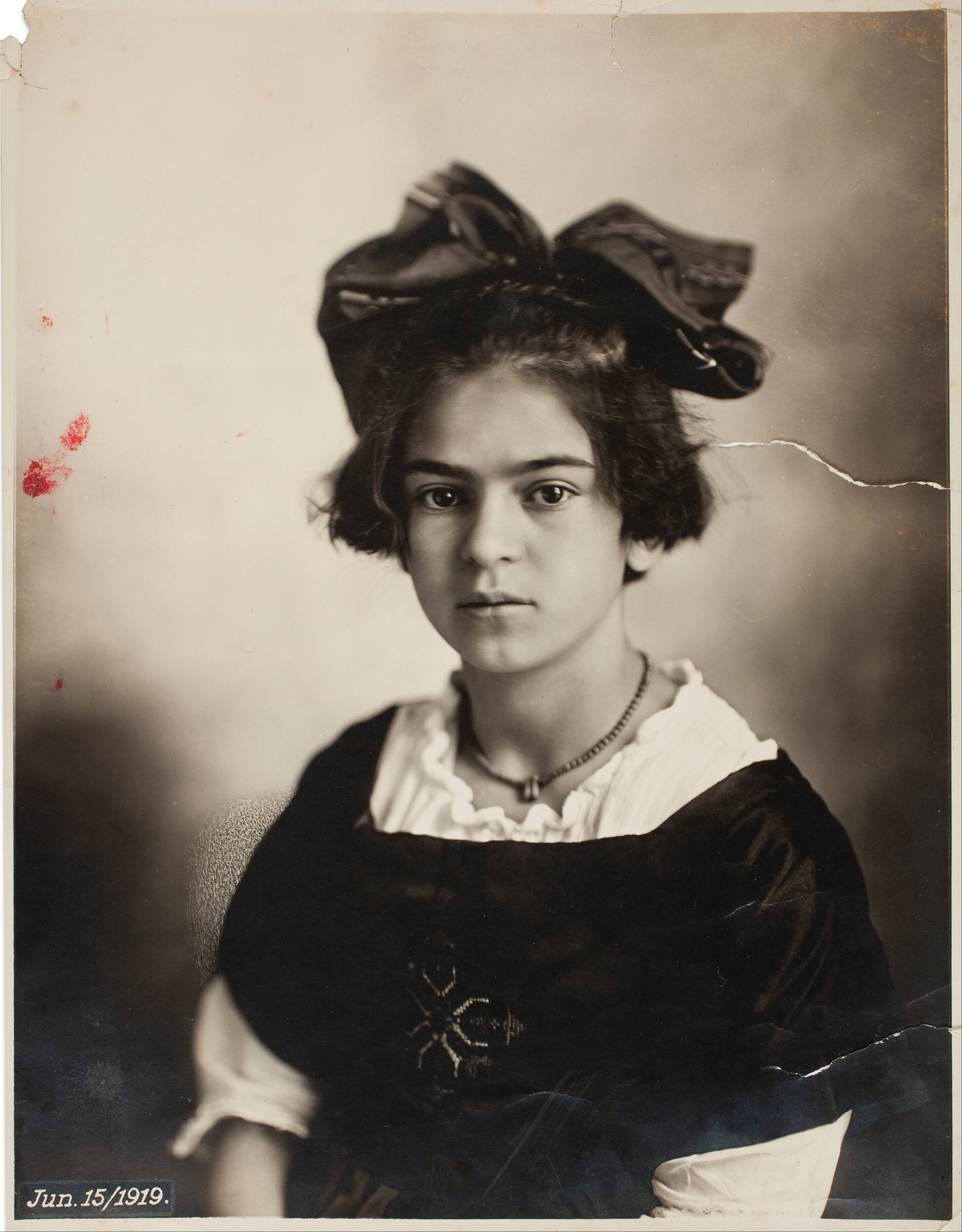 Damaged original portrait of Frida Kahlo as a young woman